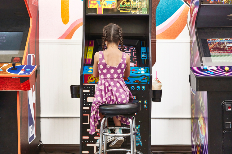 One girl and three vintage games