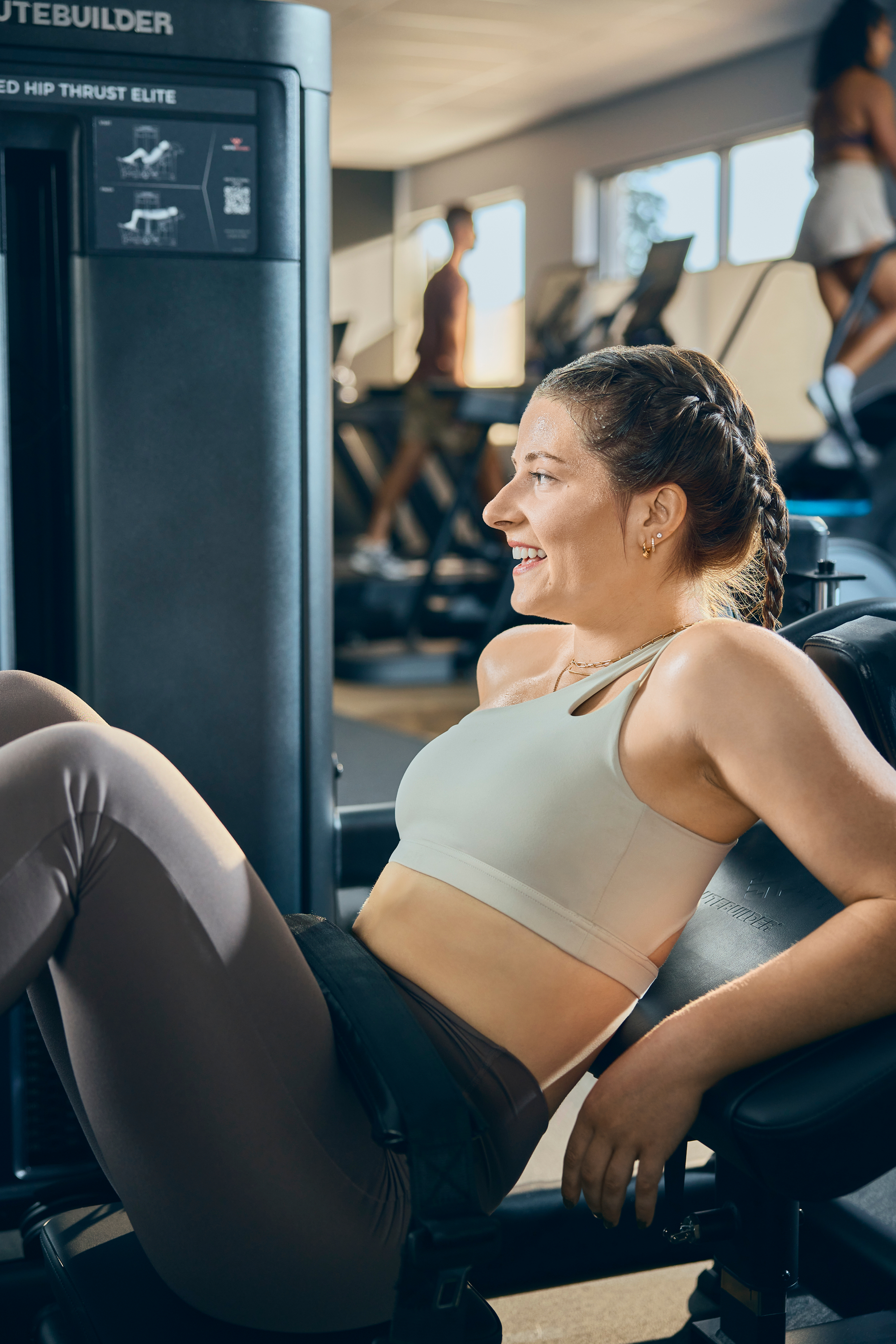 young woman on hip thrust machine 
