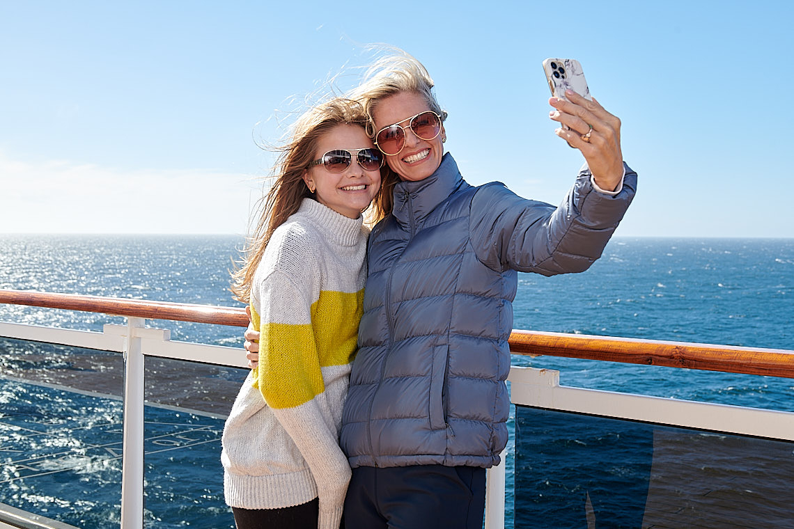 Joyful mom and daughter selfie