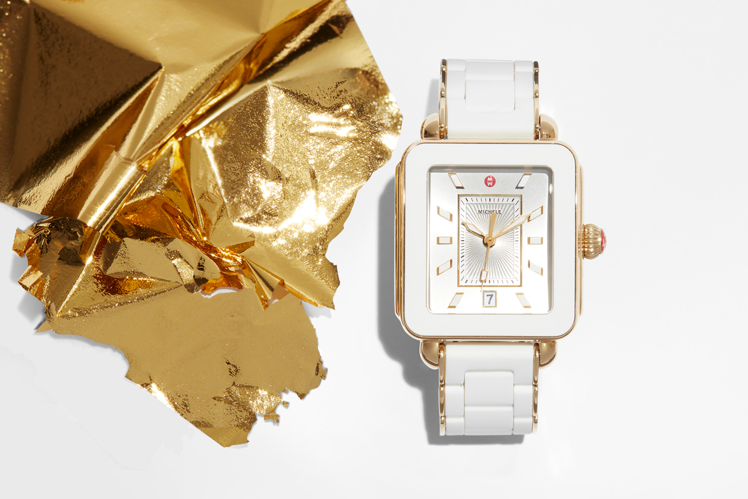 Beautiful fashion photography for Michele, a designer watch brand Gold and white timepiece