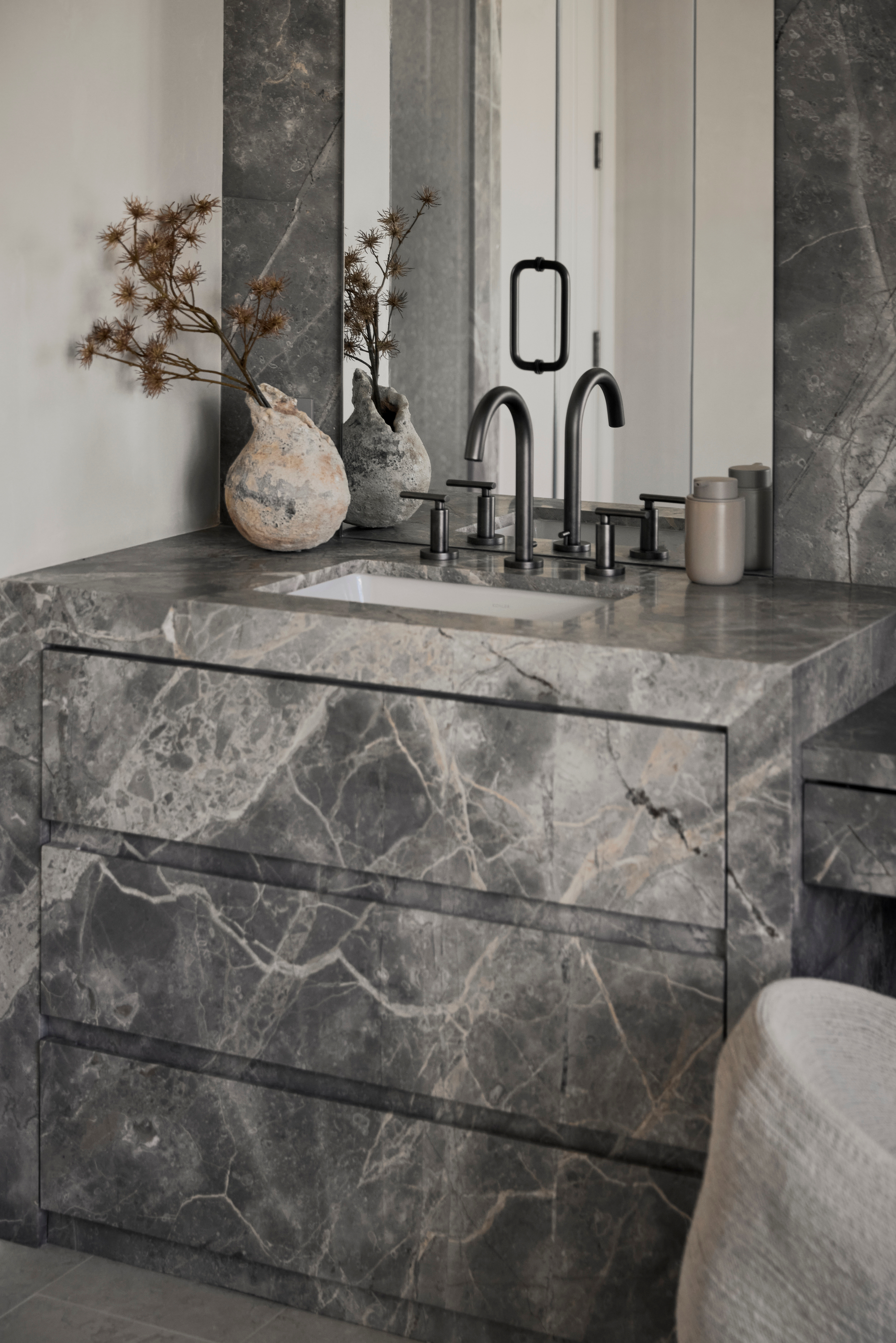 unique marble filled bathroom 