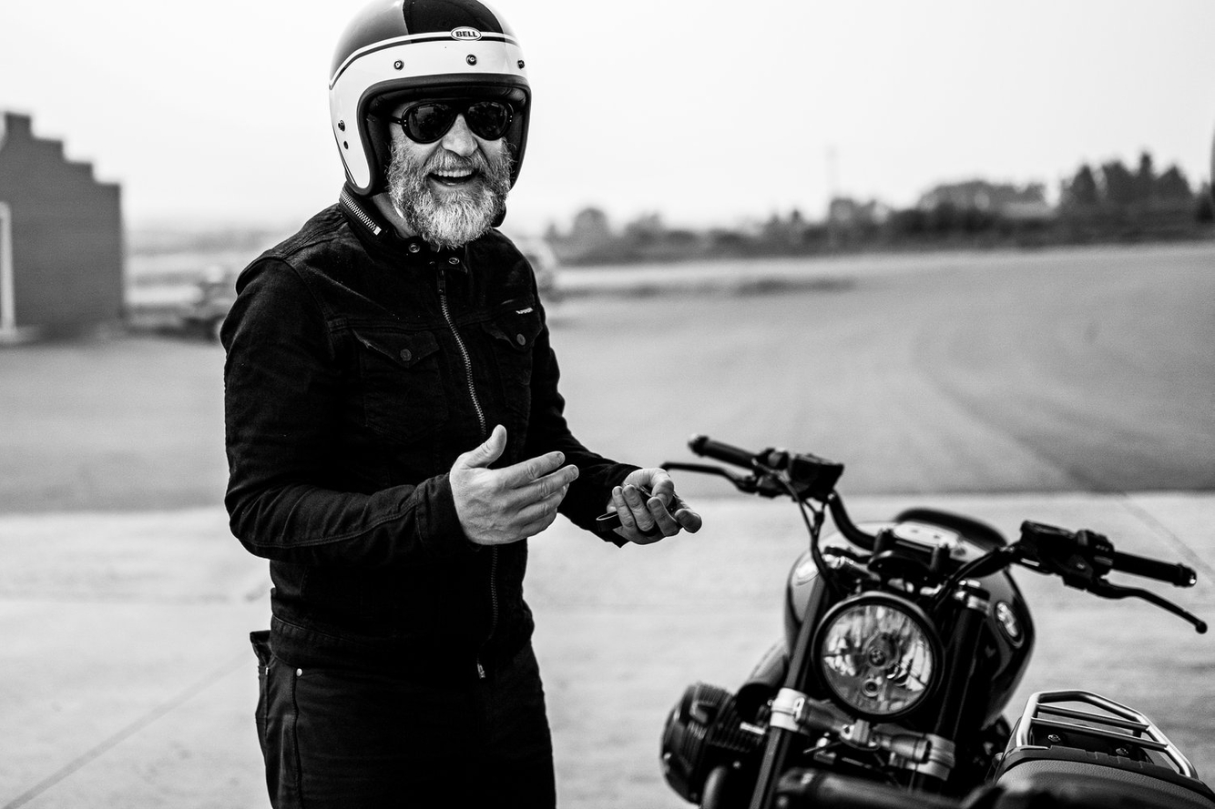 motorcycle rider with helmet and sunglasses