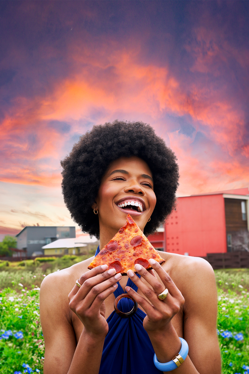 woman laughing with pizza 