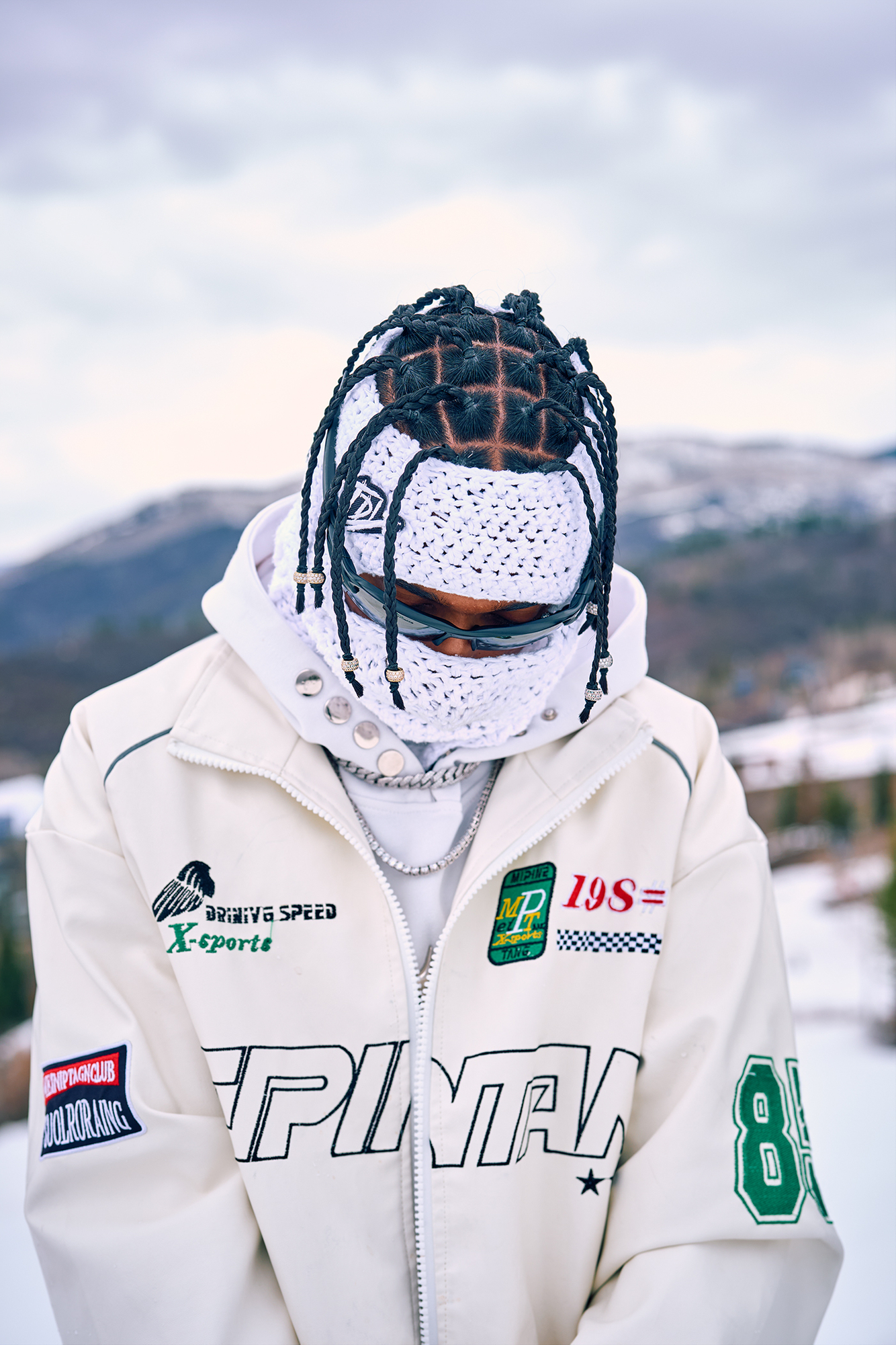 black snowboarder pro athlete snowboarder with braids