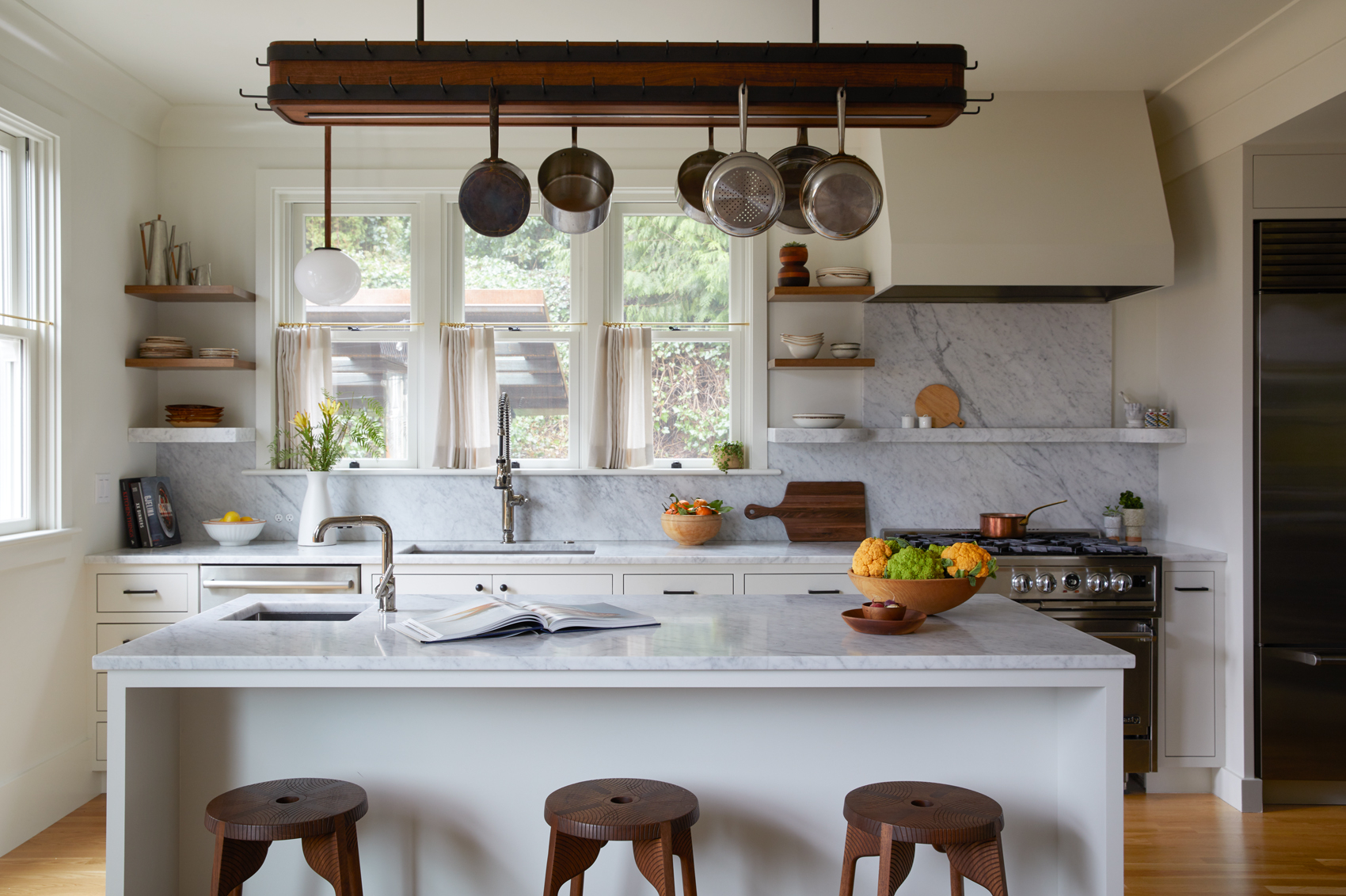 Marble counter top, Pots and pans, bar stools. The best interior design photography, interior design kitchen, kitchen design Country Kitchen with a Modern Twist
