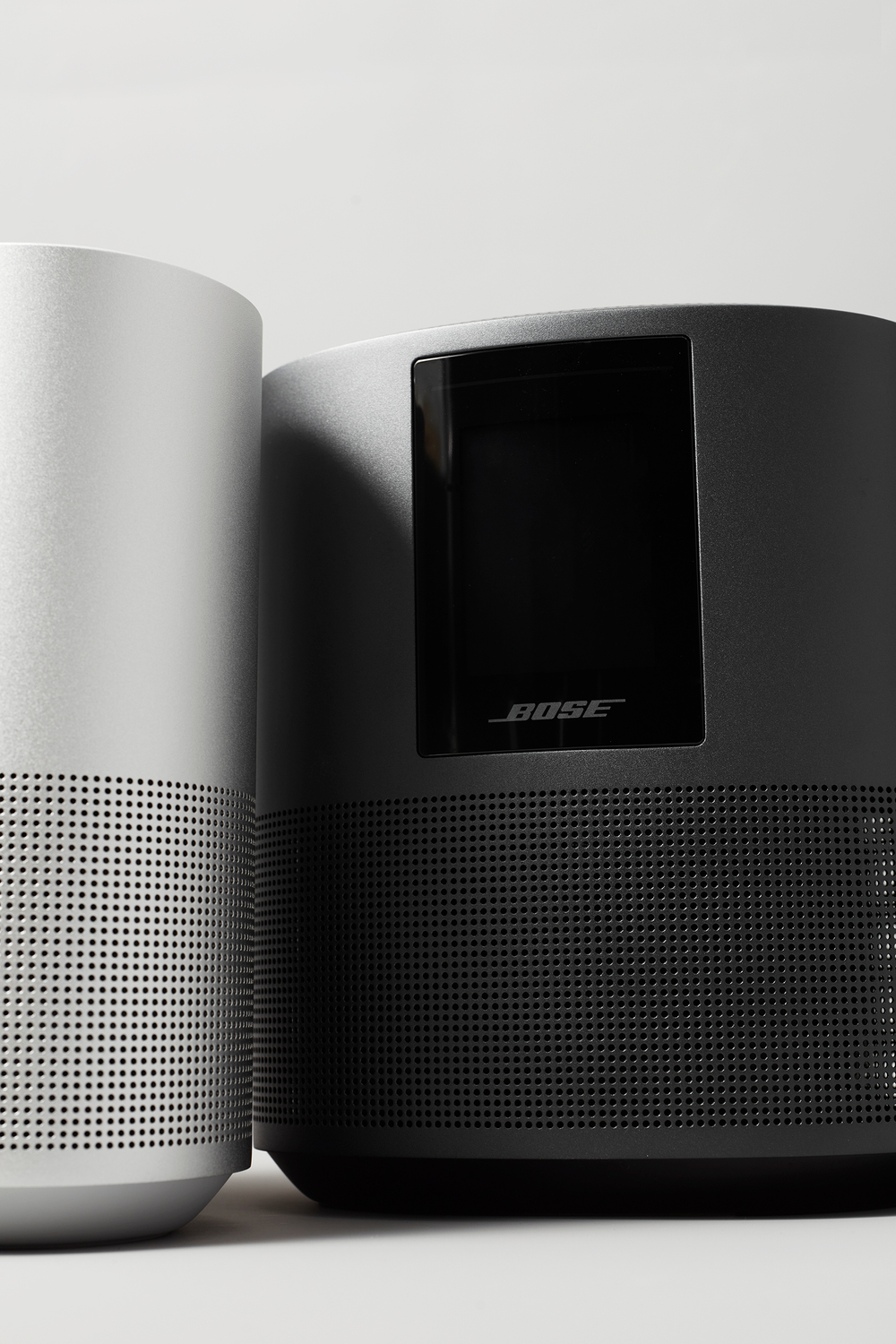 Future electronics, smart electronics, best portable speaker advertisement, blown away Black and silver sleek rounded speaker design