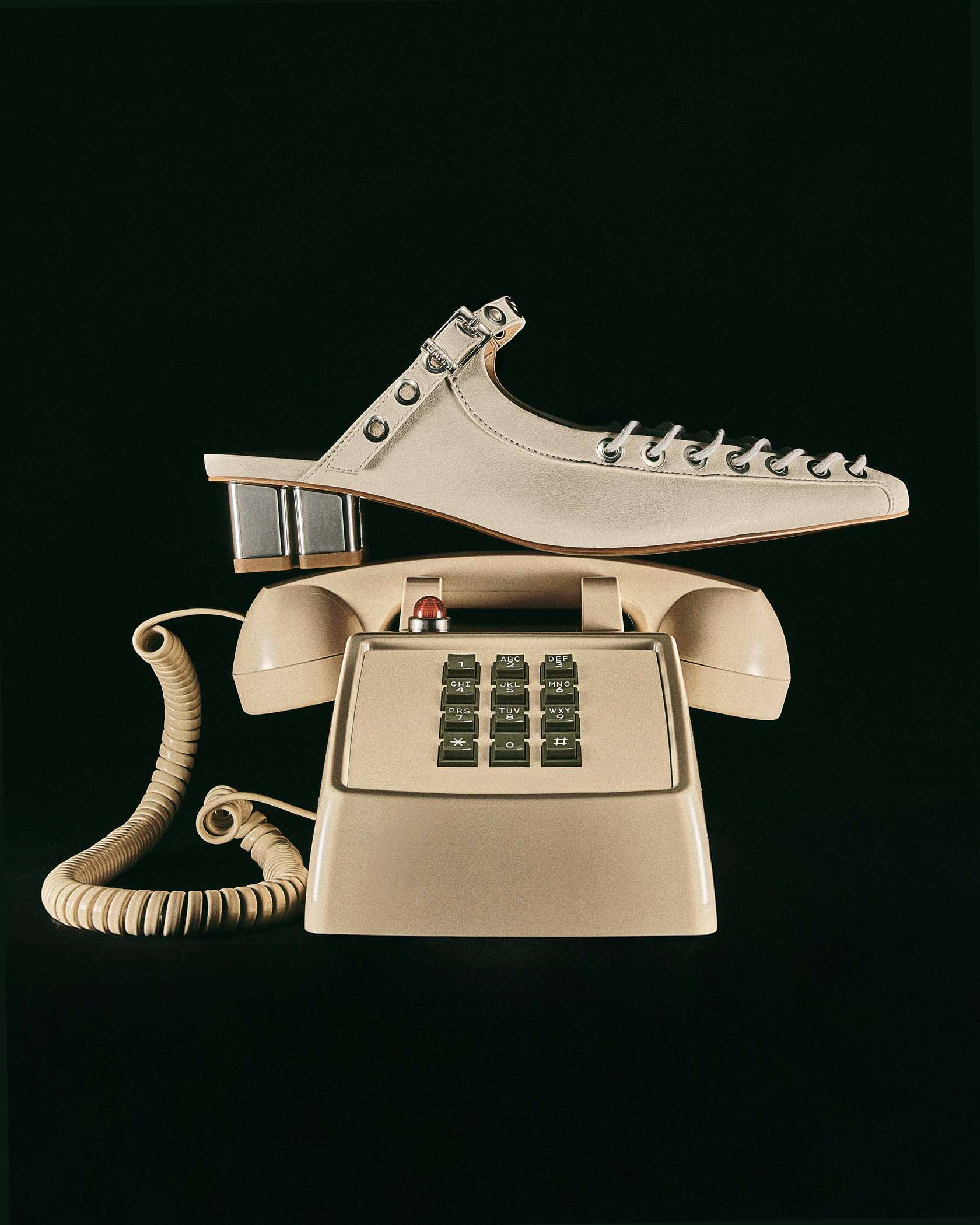 ganni shoes sit on telephone photographed by Alison Blomgren ganni shoes and accesories by Alison Blomgren