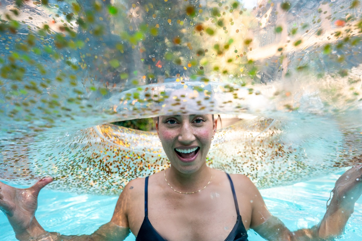 Girl in pool with floaty