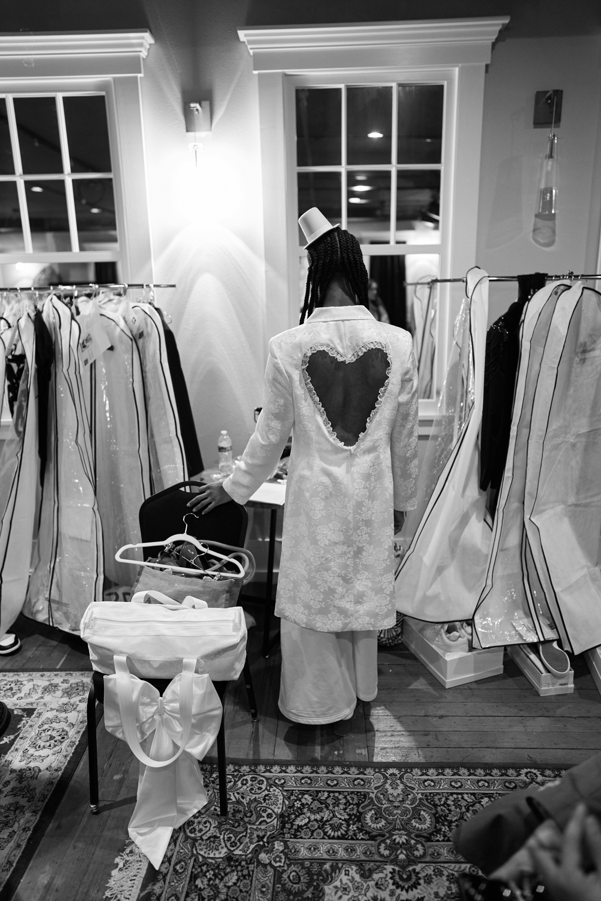 behind the scenes snapshot of models getting dressed at la paisa fashion show 