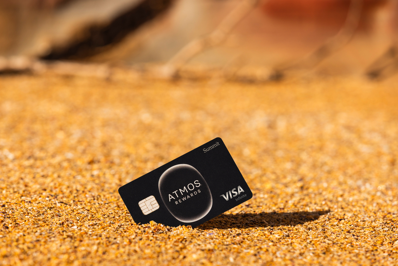 visa card in sand 