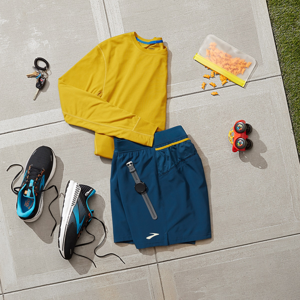 Dad’s running gear, Apple Watch, brooks shoes, and his car keys. Illustrating character and lifestyle through product photography. Annie’s cheddar bunnies from dad