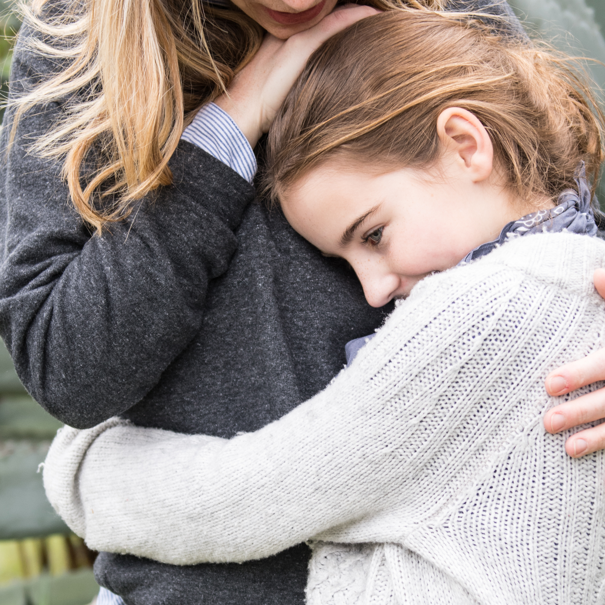Girl hugging mom