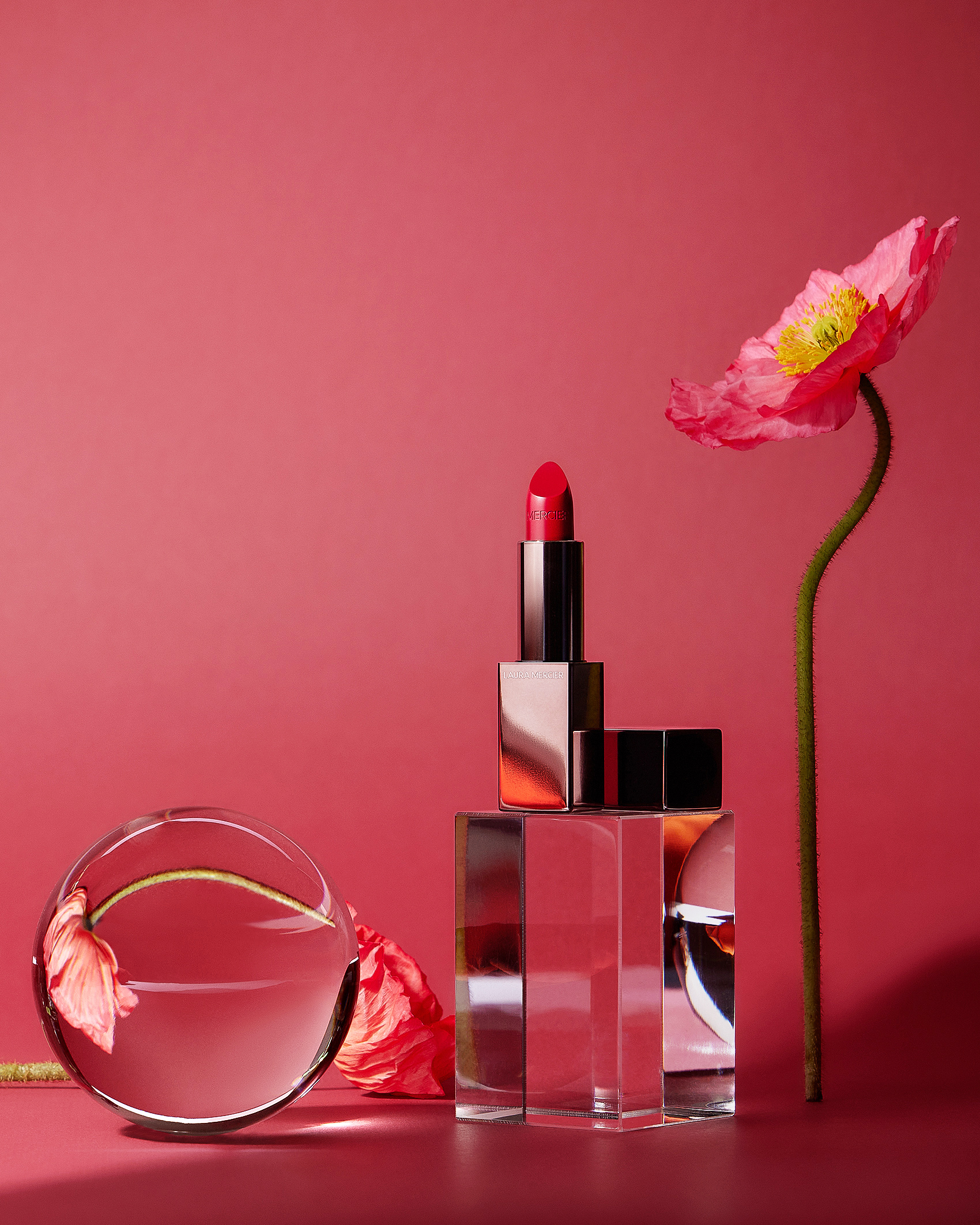 Red lipstick with pink wall