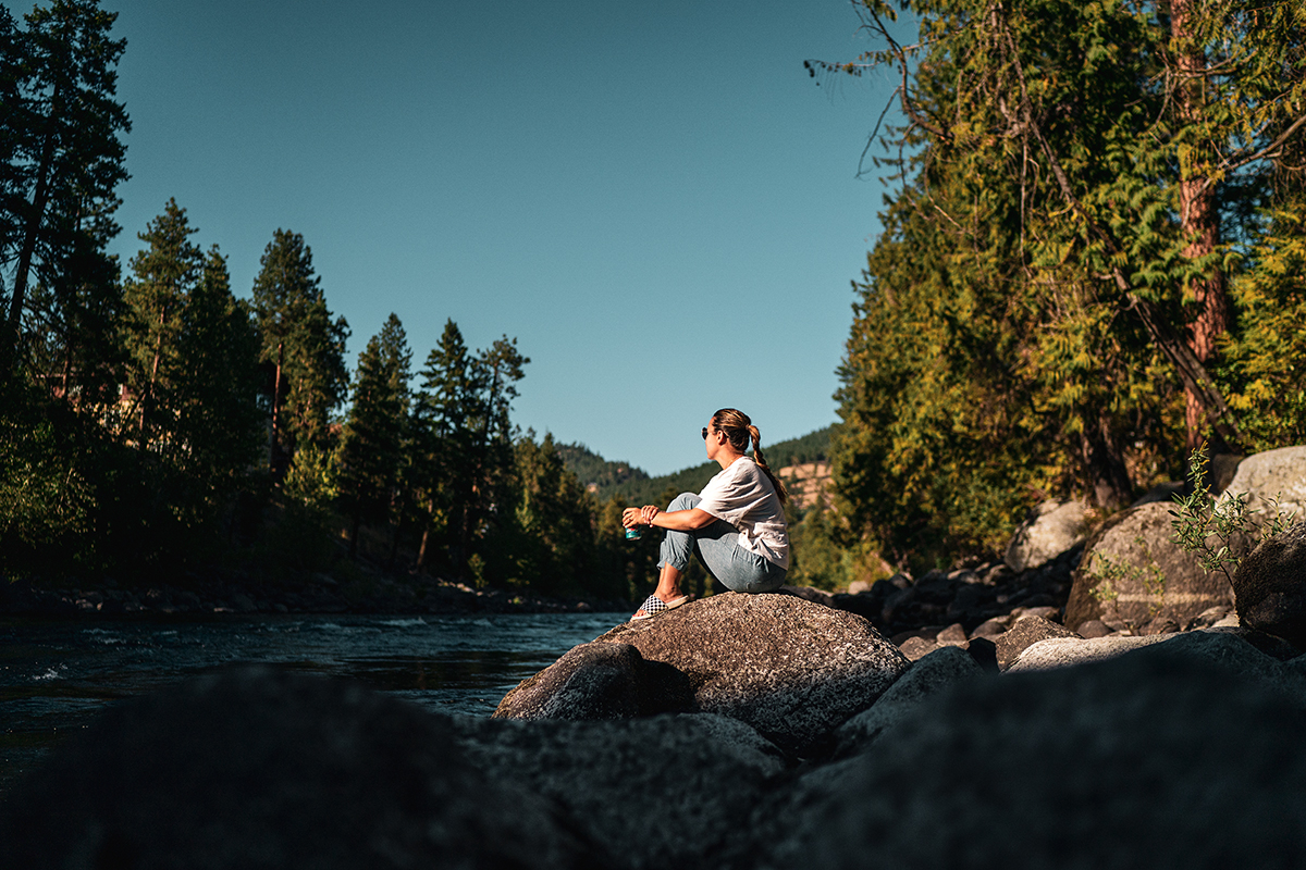 Gorgeous nature photography, PNW lifestyle, profile of sitting lady Camping lifestyle photography