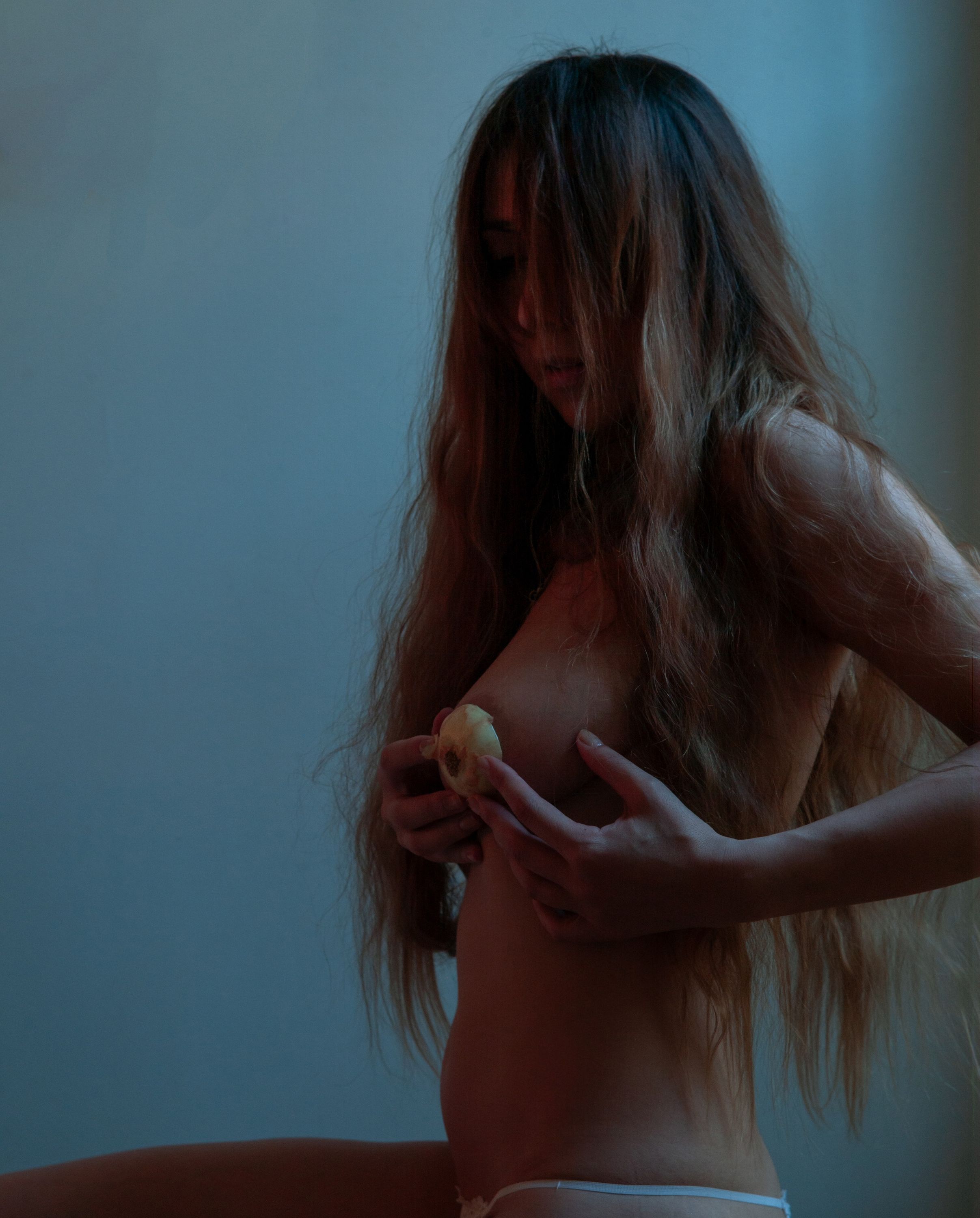 Fine art portrait “Aftertaste” by Micha Warren. A cinematic exploration of nourishment and resistance—what feeds us lingers, shaping memory and the body.