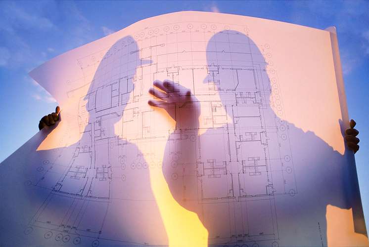 PORTFOLIO - People #21 Two Building Contractors Looking at Blueprints