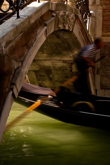 Boat under bridge- vertical