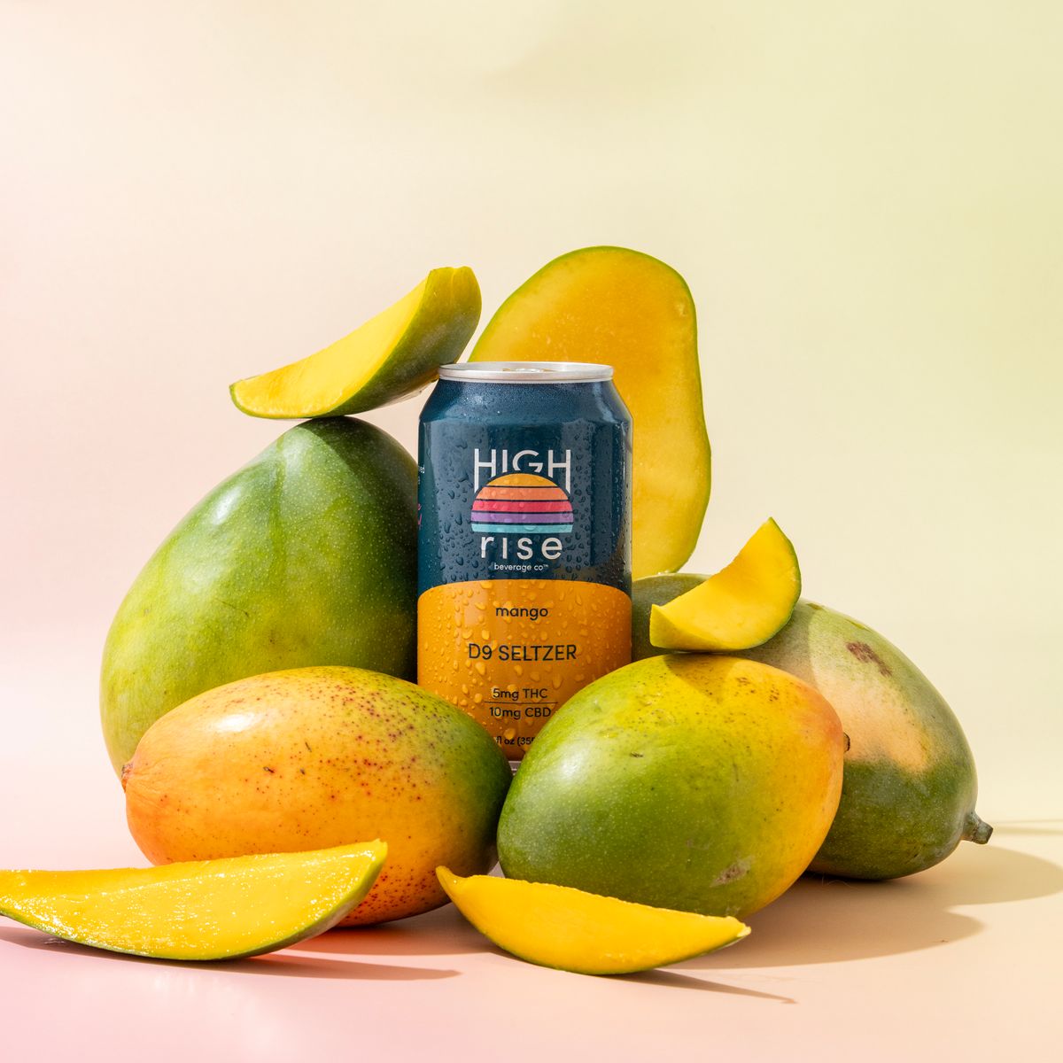 High Rise Mango Flavored THC Seltzer_Product photography made with real fruit. 