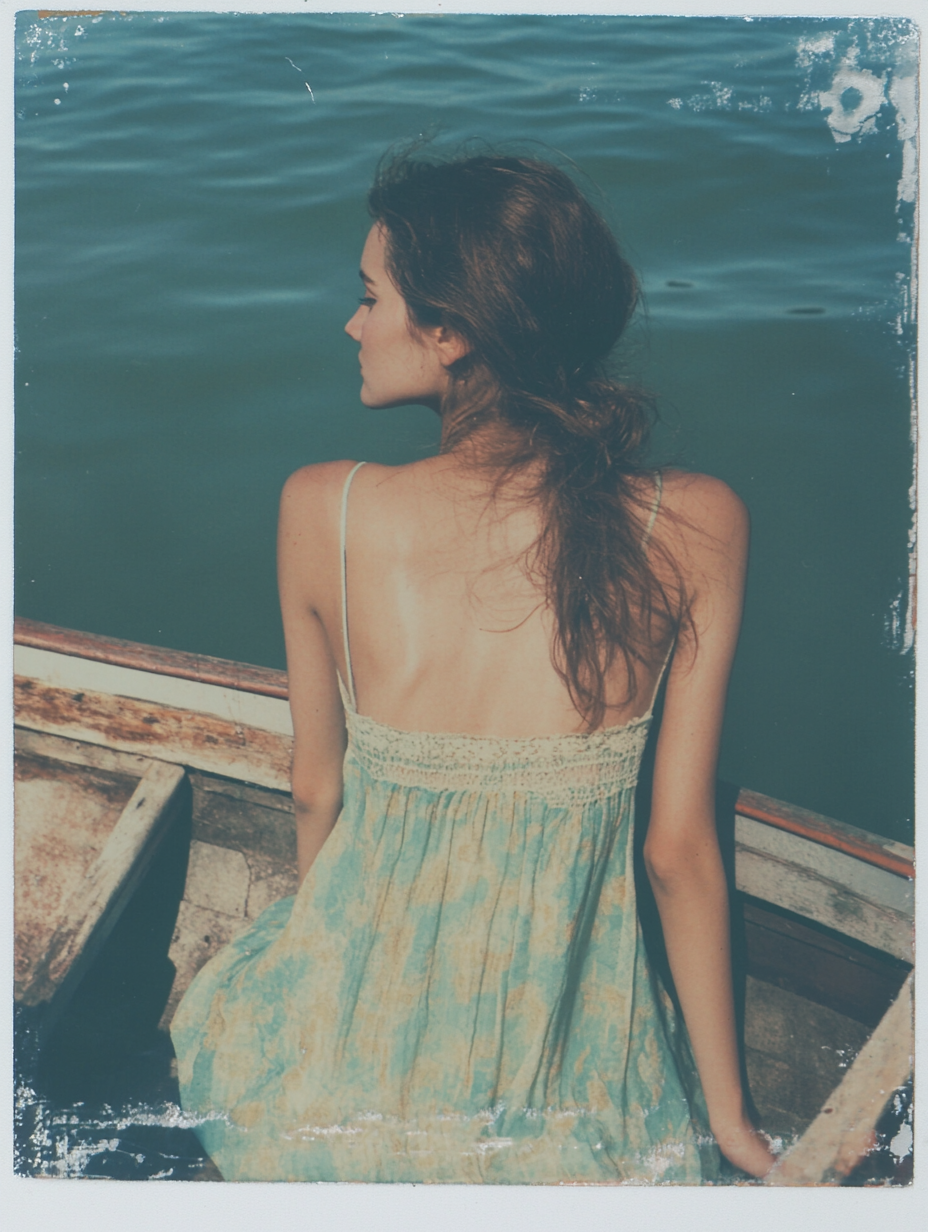u6829234697_a_Greek_woman_sitting_in_a_boat_photorealistic_sh_37d3ed06-4b2f-4f3c-a312-d46c4948d090_1.png