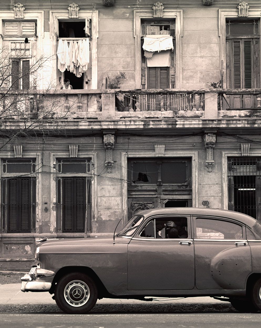 man in car  havana cuba.jpg