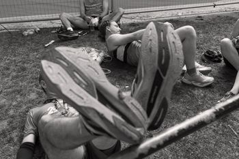 tired marathon runners Marathon runners after the finish line The Mall, London.