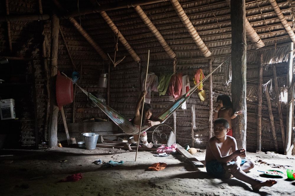 Marubo children Kai (left) Metsis (middle boy) and young girl Vena (right) in the village of Rio Novo. Amazon