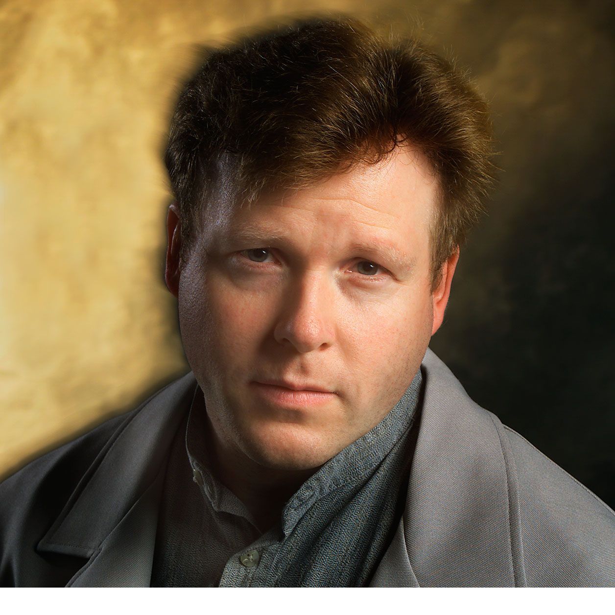 lab-worker-gray-lab-coat-headshot.jpg