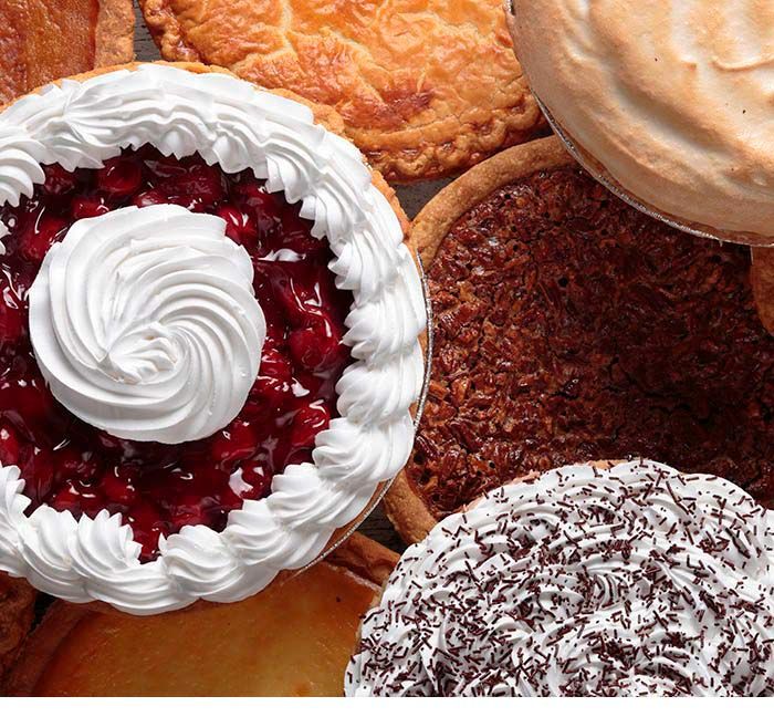 Overhead view of an assortment of fresh homestyle holiday pies