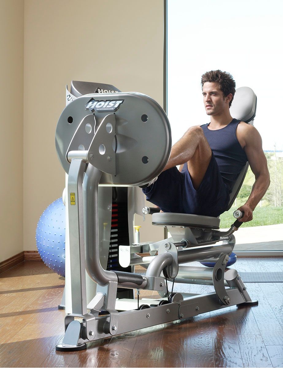 Fitness model using silver leg press machine
