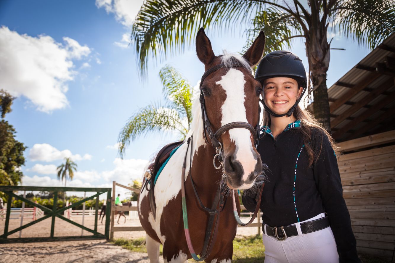 Young woman with horse