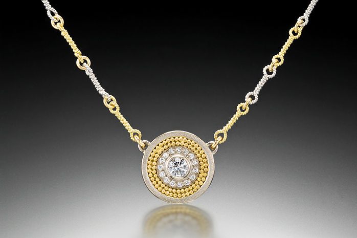 18k white gold with 20k yellow gold granulation, brushed satin finish, diamond VS-F (27 points), side diamonds VS-F (8 points), with 18k white and yellow gold handmade chain, dimensions: 14.35 mm diameter. DISC NECKLACE, STYLE 3 - $4,450