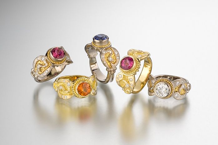 18k white gold with 20k yellow gold granulation or 18k yellow gold with 18k granulation, brushed satin finish, various center stones approx. 7mm (1.5 – 2.5 carat): sapphire, tourmaline or diamond VS-F; side diamonds VS-F (19 points)*also available in platinumThis design is offered in a range of prices. CHENILLE RING COLLECTION