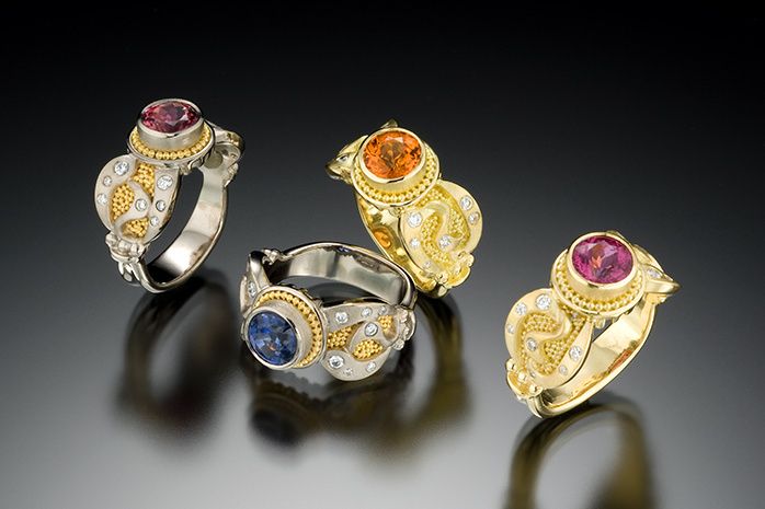 18k white gold with 22k yellow gold granulation or 18k yellow gold with 18k granulation, brushed satin finish, various center stones approx. 7mm (1.5 – 2.5 carat): sapphire, tourmaline; diamonds VS-F (total diamond weight 19 points)*also available in platinumThis design is offered in a range of prices. Please contact us for details at 415-332-0802 CHENILLE RING COLLECTION