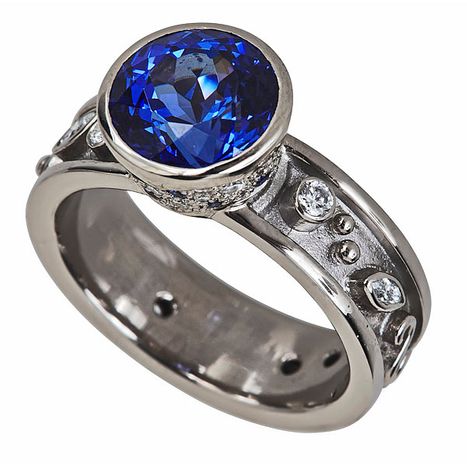 Side ViewTanzanite Ring. 18k white gold, Tanzanite, diamonds VS/F TANZANITE PASSION RING