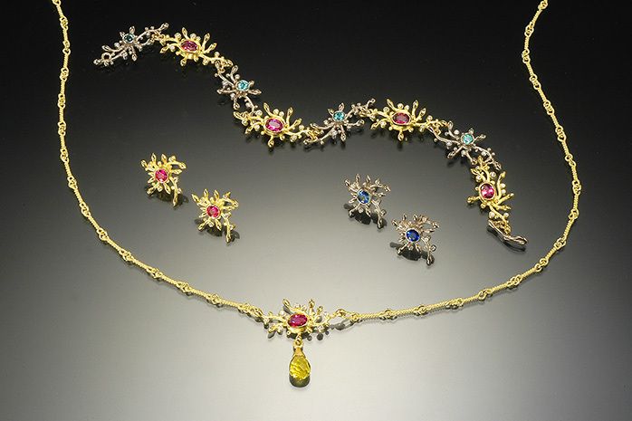 Necklace, Earrings and Bracelet 18k yellow gold, 18k white gold, tourmalines, sapphires, rubies, diamonds VS-G/HThese designs are offered in a range of prices. Please contact us for details at 415-332-0802 SUN LINK / CONSTELLATION COLLECTION