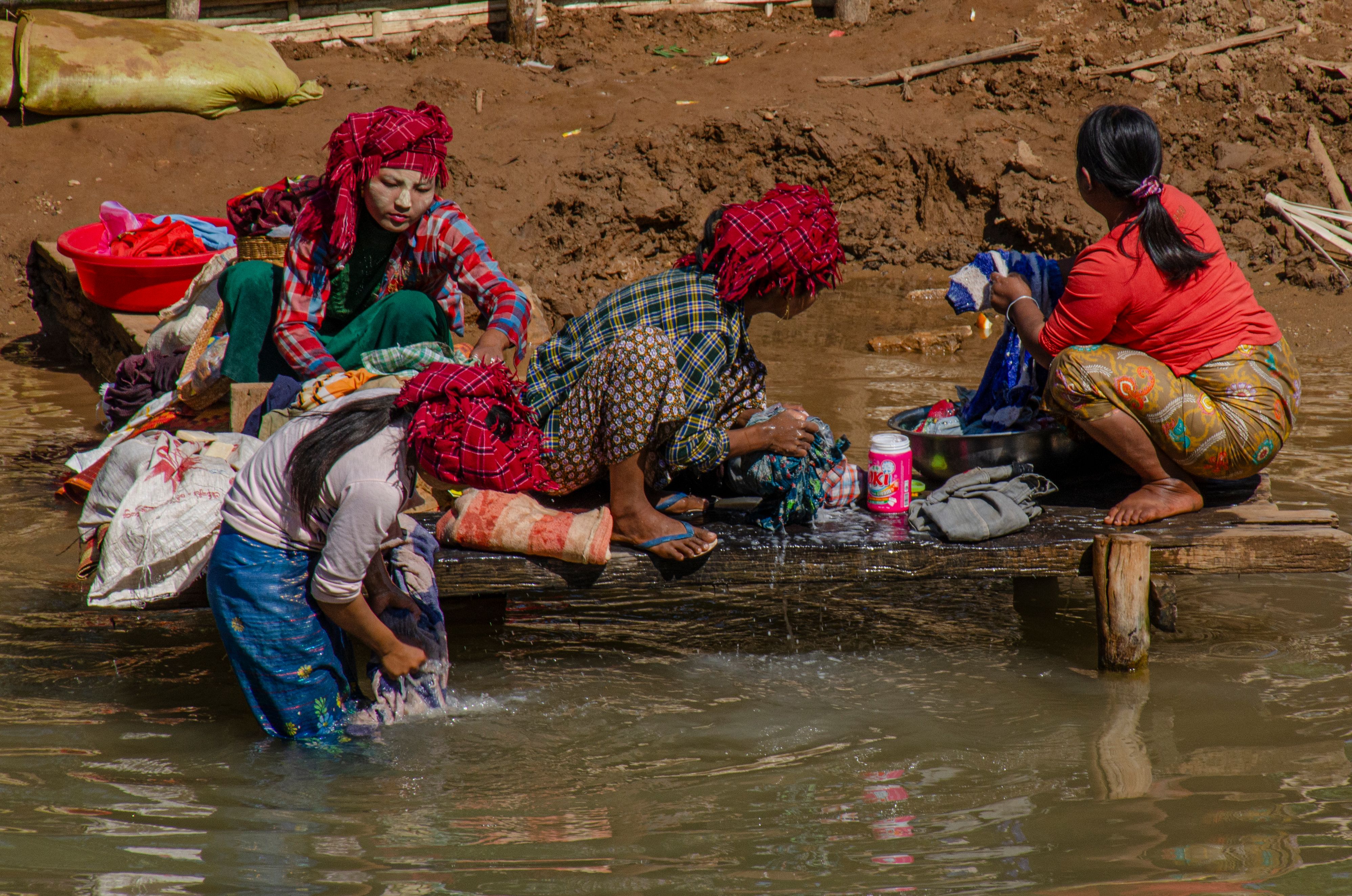 Women washing clothes, Myanmar
