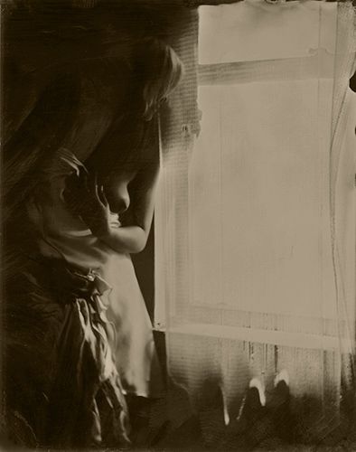 amber   peeking   thru   window