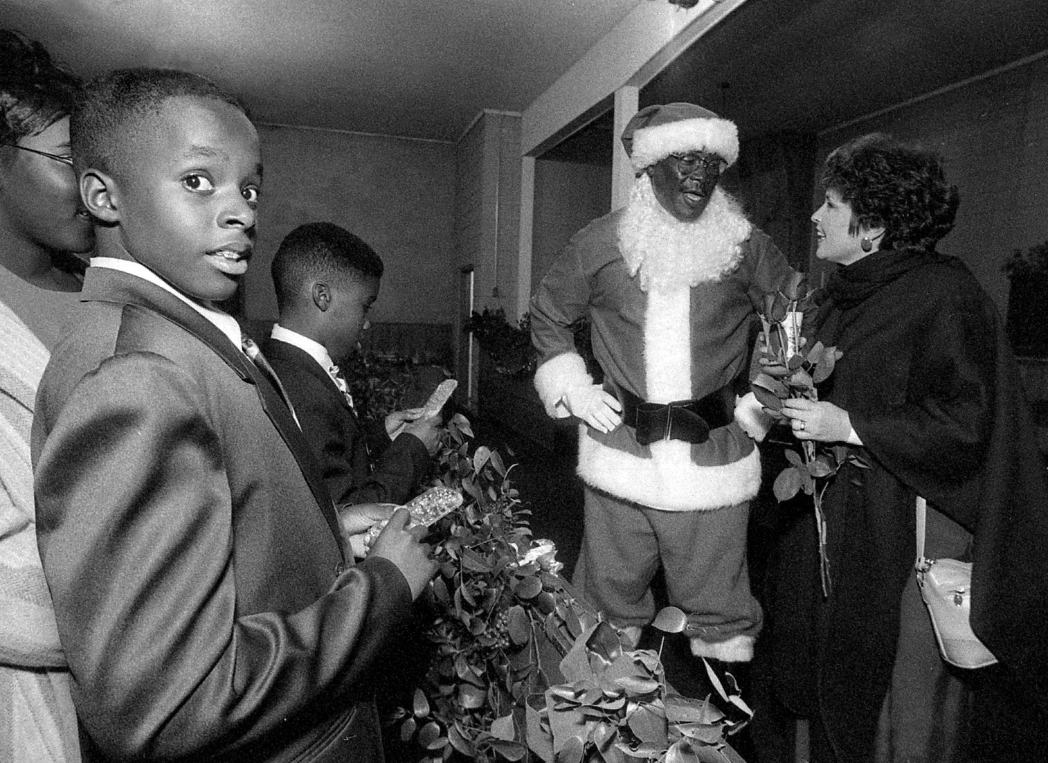 Kids and Kathy Harvin with Santa Lindsey_WEB.jpg