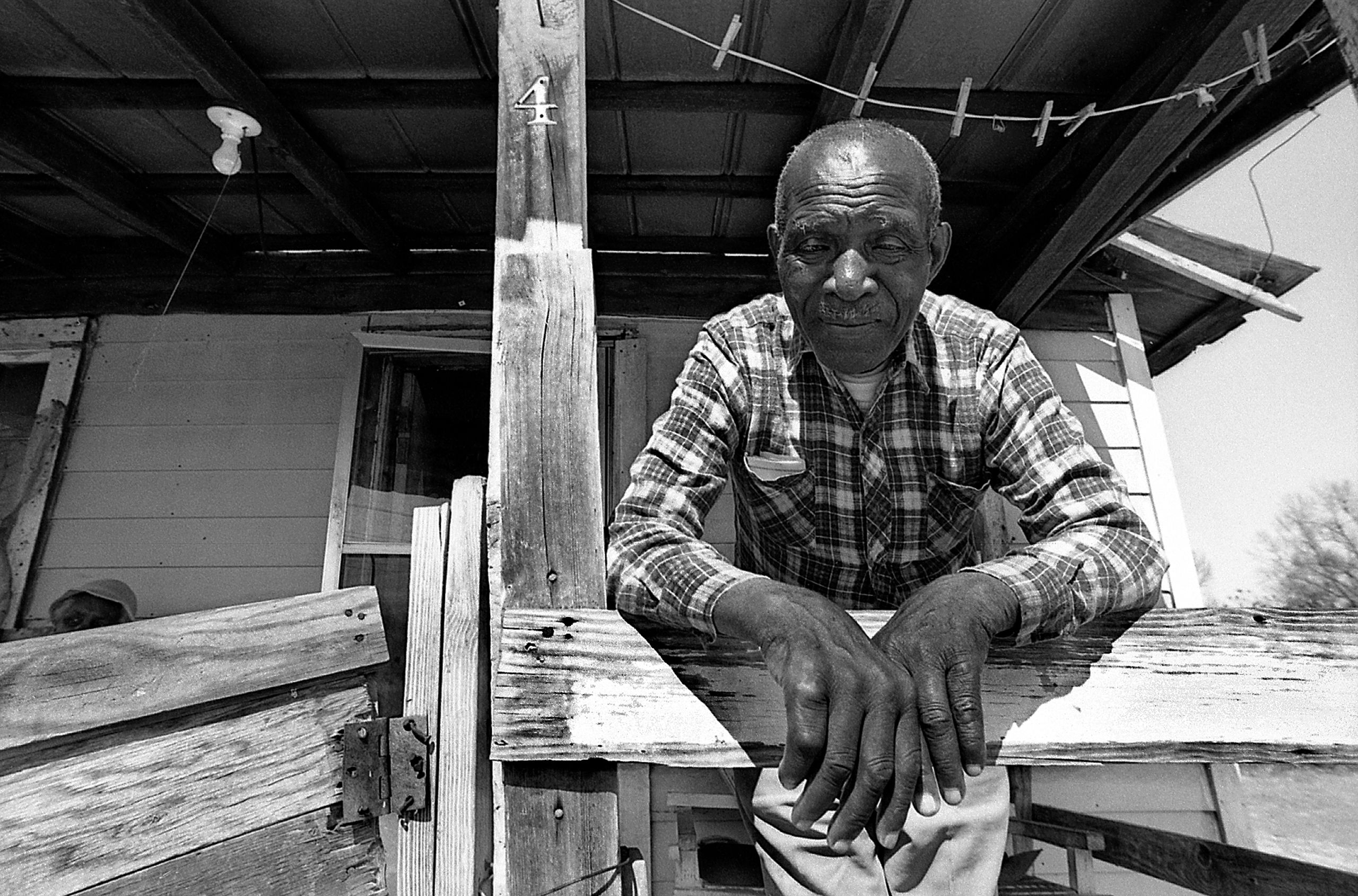 img240_Man on porch_closeup_No.4_Ston_W.jpg