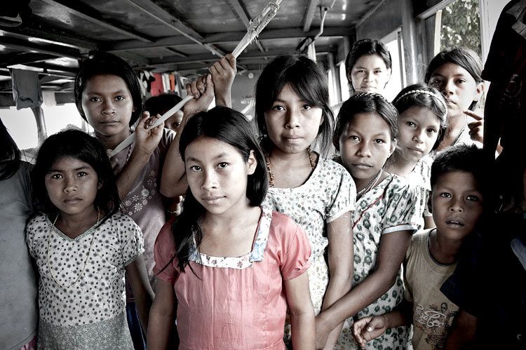 Youth on a riverboat on the Rio Napo near Santa Maria Peru 1girls_santa_maria_peru