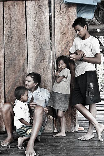 Three generations of family homesteading on the Rio Napo near Iquitos Peru 1mulitgeneration_rio_napo_peru