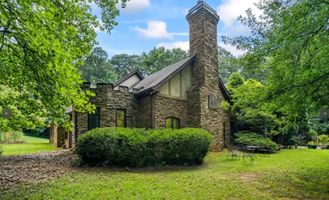 30-cipresso-castle-decatur-stone-chimney-side-exterior.jpg