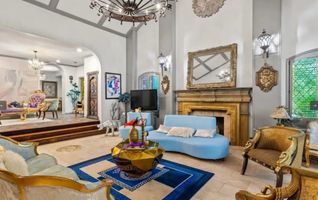 01-cipresso-castle-decatur-grand-living-room-blue-sofa.jpg
