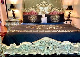 05-cipresso-castle-decatur-black-gold-ornate-bedroom.jpg