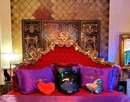 20-cipresso-castle-decatur-red-bedroom-headboard-detail.jpg