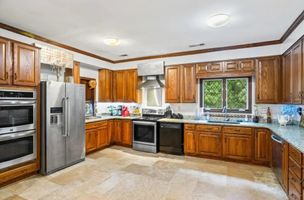23-cipresso-castle-decatur-kitchen-wood-cabinets.jpg