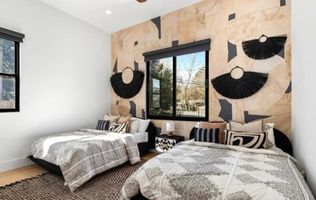 20-atlanta-modern-luxury-estate-bedroom-twin-beds.jpg