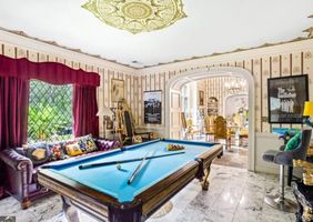 08-cipresso-castle-decatur-billiards-room-arched-view.jpg