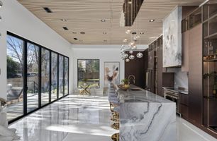 12-atlanta-modern-luxury-estate-marble-kitchen-side-view.jpg