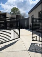 28-atlanta-modern-luxury-estate-gated-driveway-entrance.jpg
